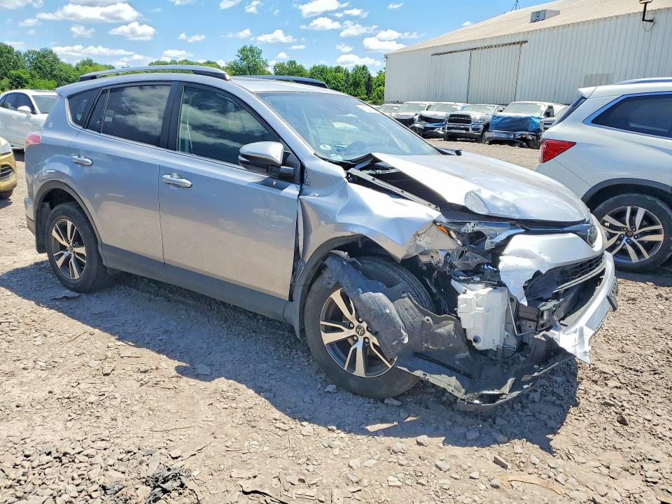 Photo 4 from auction – 2018 TOYOTA RAV4 with VIN JTMRFREV2JD254110