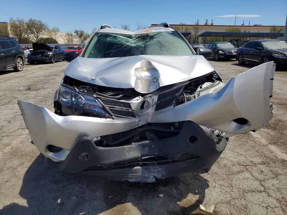 Photo 5 from auction – 2014 TOYOTA RAV4 with VIN JTMZFREV7EJ019824