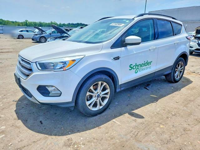 FORD ESCAPE 2018 with VIN 1FMCU0GD4JUC17177 - Photo from auction