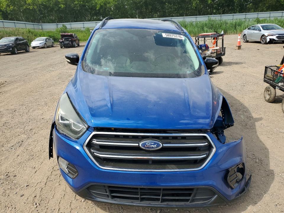 Photo 5 from auction – 2017 FORD ESCAPE with VIN 1FMCU0J93HUB23385