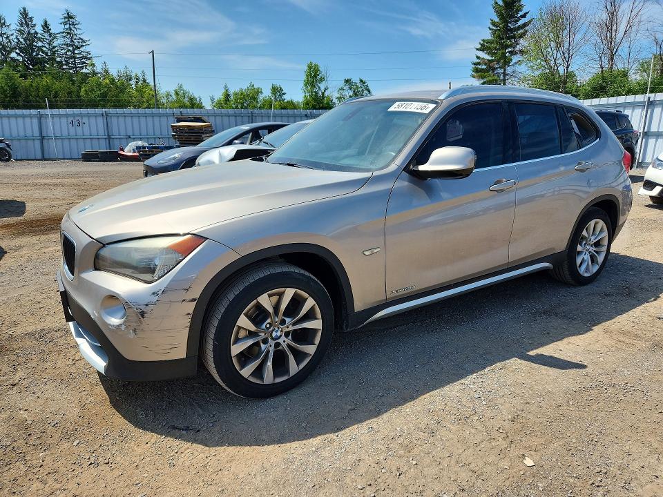 BMW X1 2012 with VIN WBAVL1C50CVR79310 - Photo from auction