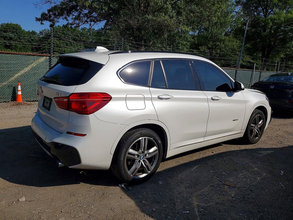 Photo 3 from auction – 2018 BMW X1 with VIN WBXHT3C31J5K24029