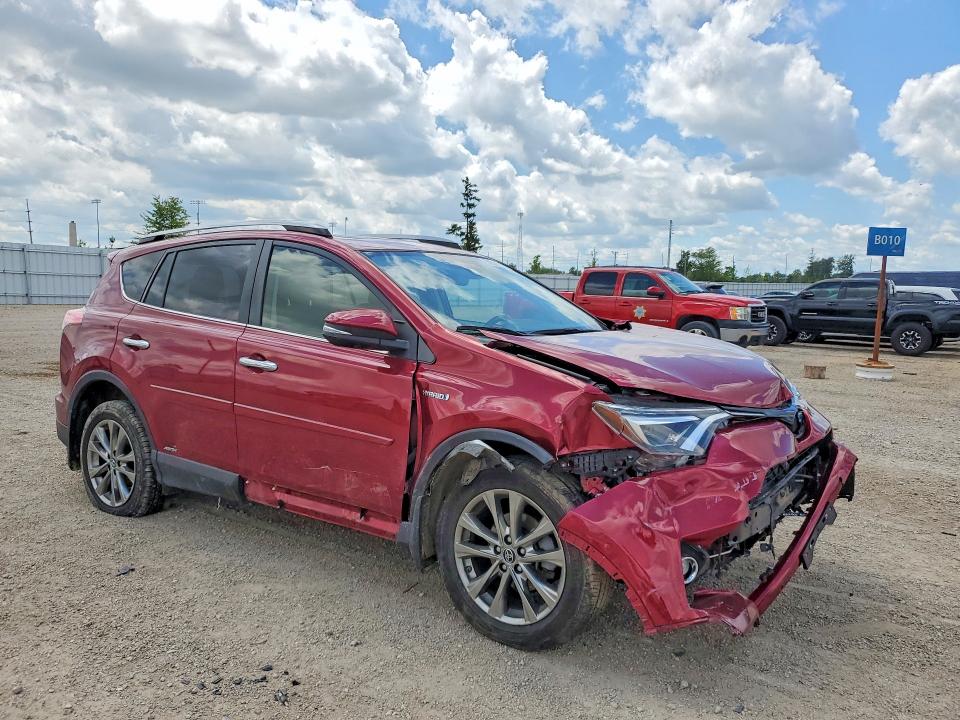 Photo 4 from auction – 2018 TOYOTA RAV4 with VIN JTMDJREV9JD233439