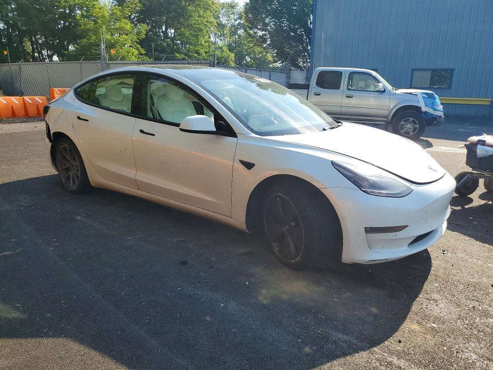 Photo 4 from auction – 2022 TESLA MODEL 3 with VIN 5YJ3E1EB4NF364249