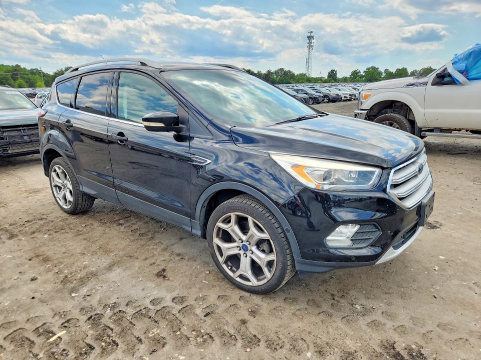 Photo 4 from auction – 2017 FORD ESCAPE with VIN 1FMCU9J95HUD05495