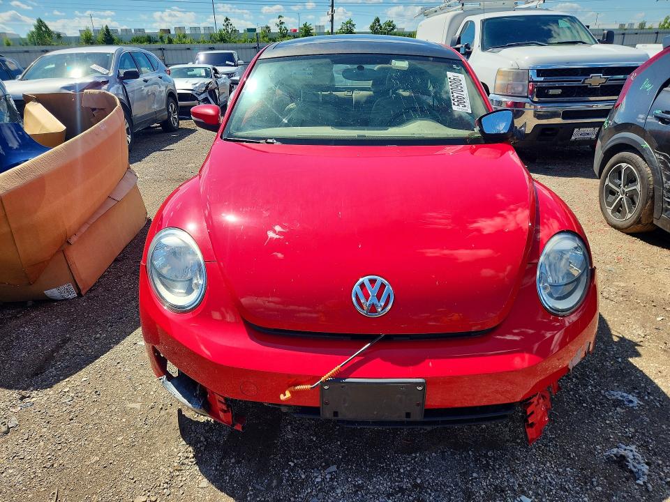 Photo 5 from auction – 2013 VOLKSWAGEN BEETLE with VIN 3VWJX7AT3DM681675