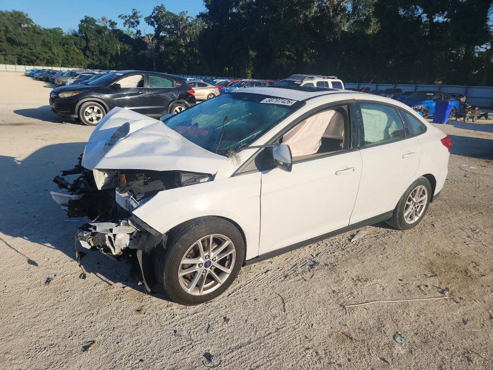 FORD FOCUS 2016 with VIN 1FADP3F26GL214044 - Photo from auction