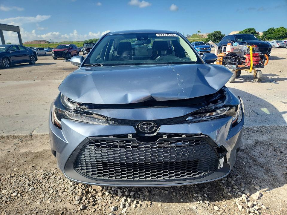 Photo 5 from auction – 2021 TOYOTA COROLLA with VIN JTDDPMAEXMJ171983
