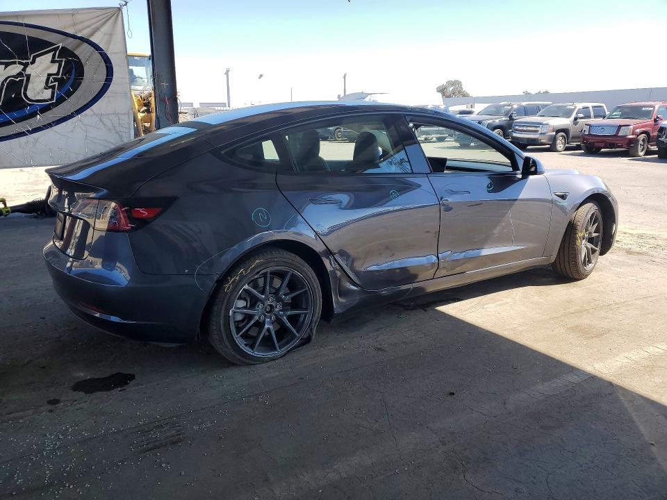 Photo 3 from auction – 2023 TESLA MODEL 3 with VIN 5YJ3E1EAXPF676358