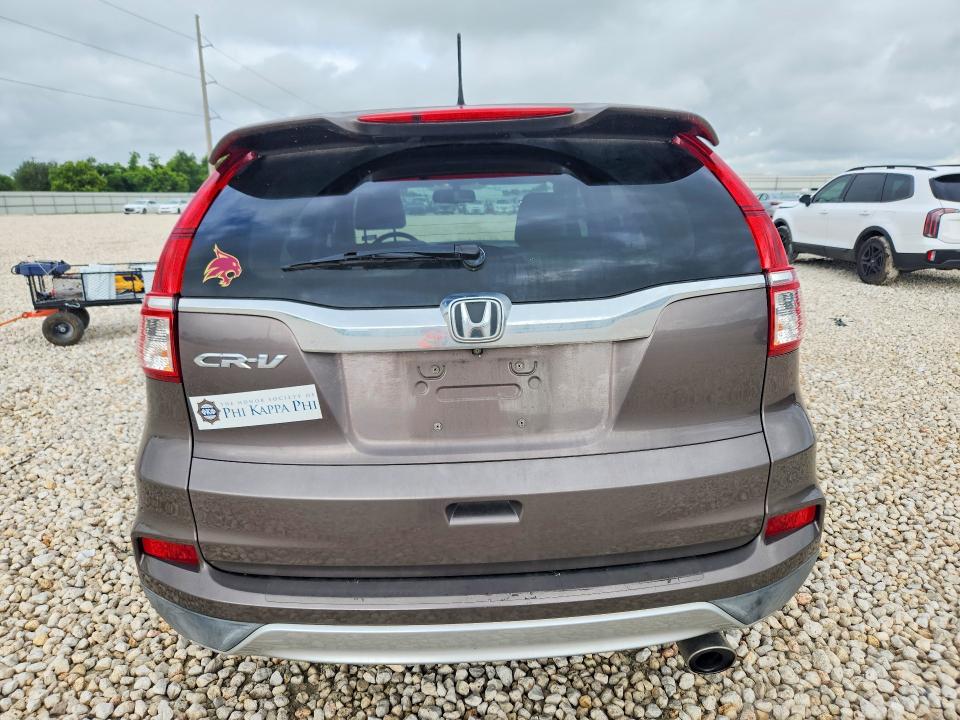 Photo 6 from auction – 2015 HONDA CR-V with VIN 2HKRM3H75FH510211