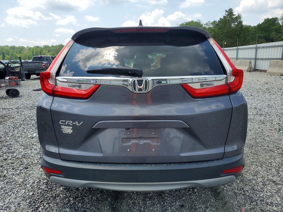 Photo 6 from auction – 2018 HONDA CR-V with VIN 2HKRW1H57JH506733