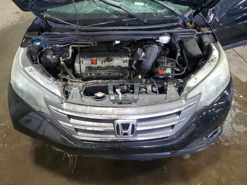 Photo 11 from auction – 2014 HONDA CR-V with VIN 5J6RM4H72EL071561