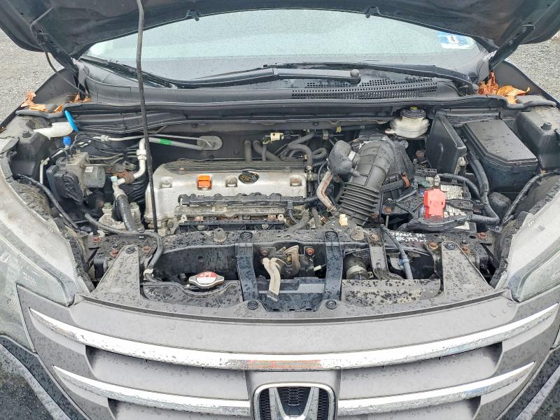 Photo 12 from auction – 2014 HONDA CR-V with VIN 2HKRM4H32EH643431