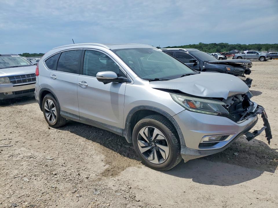 Photo 4 from auction – 2016 HONDA CR-V with VIN 5J6RM4H99GL101028