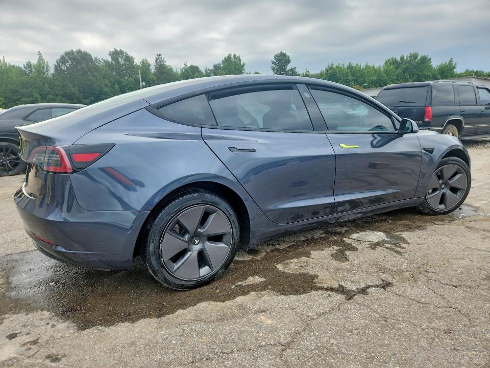 Photo 3 from auction – 2021 TESLA MODEL 3 with VIN 5YJ3E1EA0MF906131