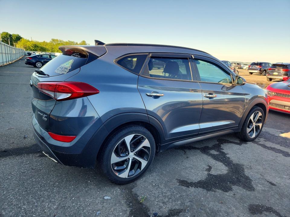Photo 3 from auction – 2016 HYUNDAI TUCSON with VIN KM8J3CA21GU095907