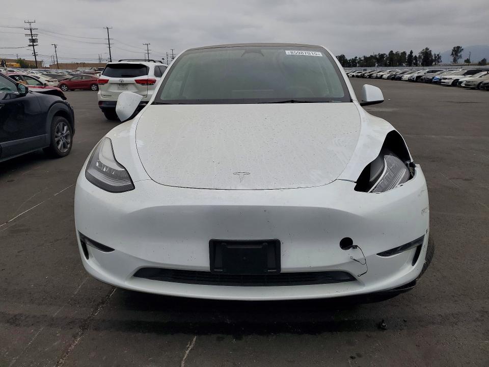 Снимка 5 от търг – 2023 TESLA MODEL Y с VIN 7SAYGDEE3PA075149