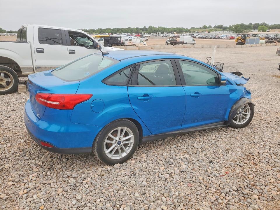 Photo 3 from auction – 2015 FORD FOCUS with VIN 1FADP3F24FL274578