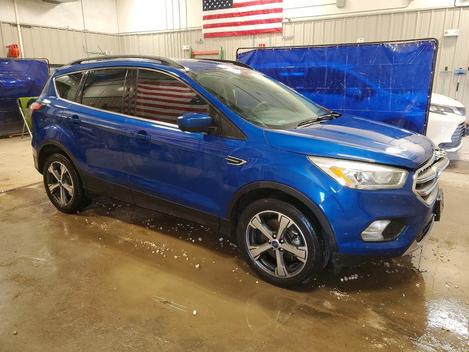 Foto 4 de la subasta – 2017 FORD ESCAPE con VIN 1FMCU9G98HUD93529