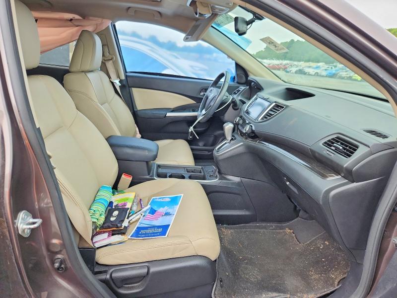 Photo 7 from auction – 2015 HONDA CR-V with VIN 2HKRM3H76FH539197