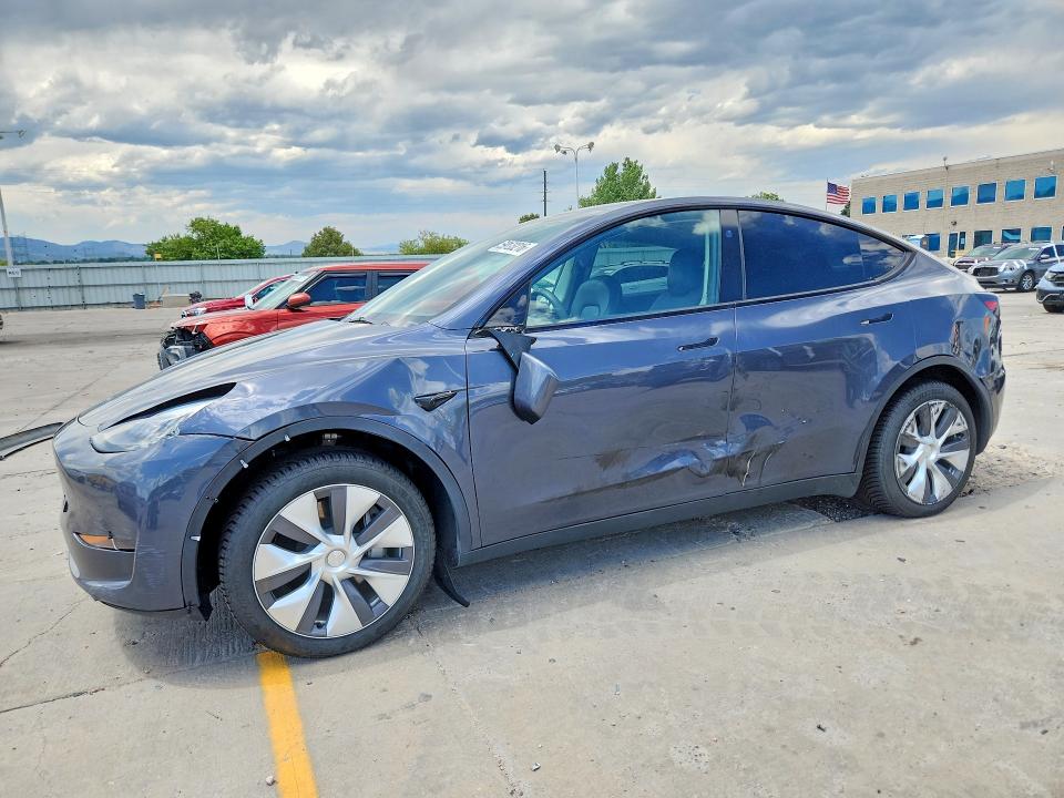 TESLA MODEL Y 2023 with VIN 7SAYGDEE8PF935484 - Photo from auction