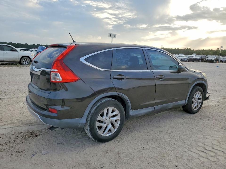Photo 3 from auction – 2015 HONDA CR-V with VIN 2HKRM3H55FH552540