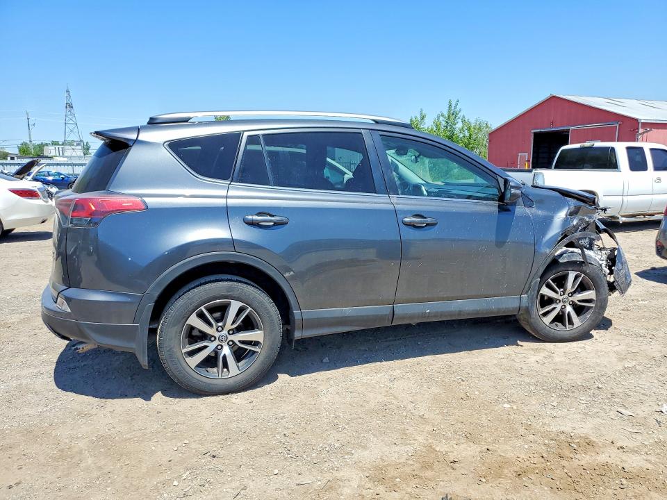 Photo 3 from auction – 2018 TOYOTA RAV4 with VIN 2T3BFREV8JW778026