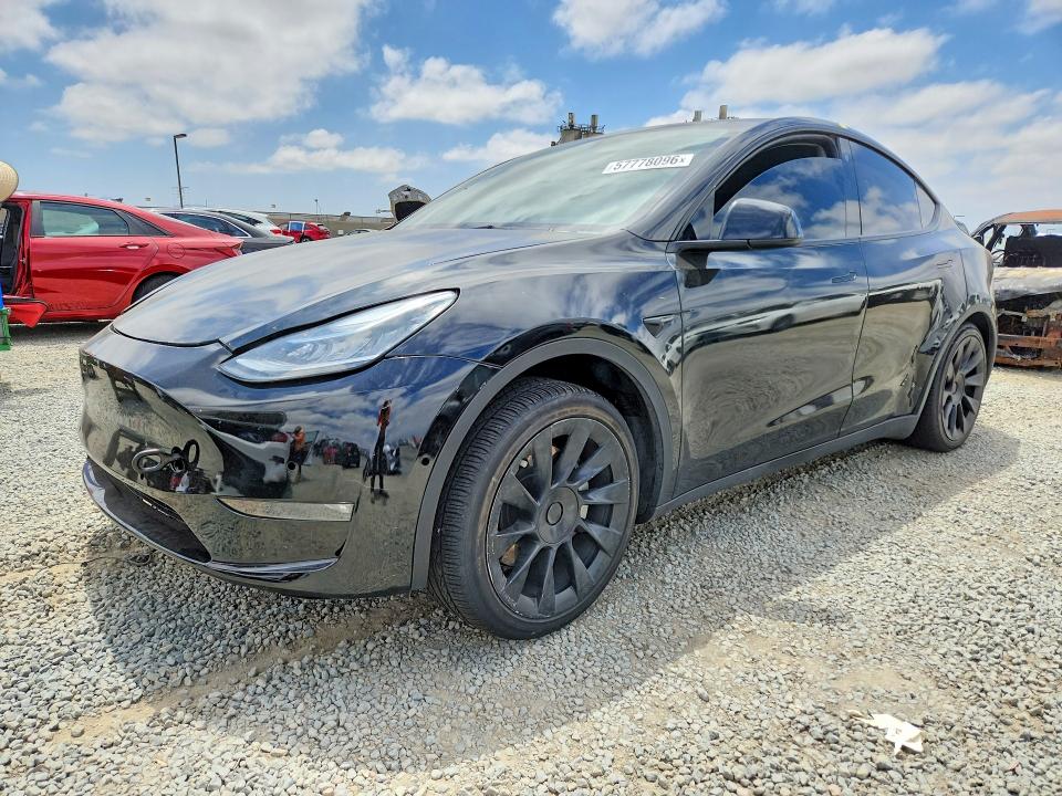 TESLA MODEL Y 2023 with VIN 7SAYGAEE2PF615575 - Photo from auction