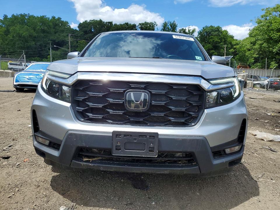 Photo 5 from auction – 2023 HONDA PASSPORT with VIN 5FNYF8H55PB034950