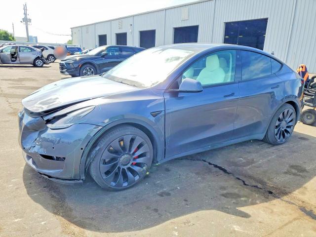 TESLA MODEL Y 2022 with VIN 7SAYGDEF3NF462602 - Photo from auction