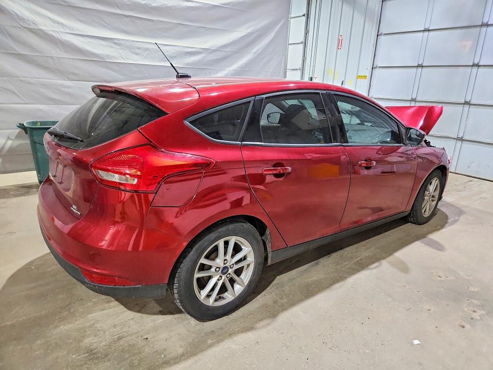 Photo 3 from auction – 2016 FORD FOCUS with VIN 1FADP3K29GL394142