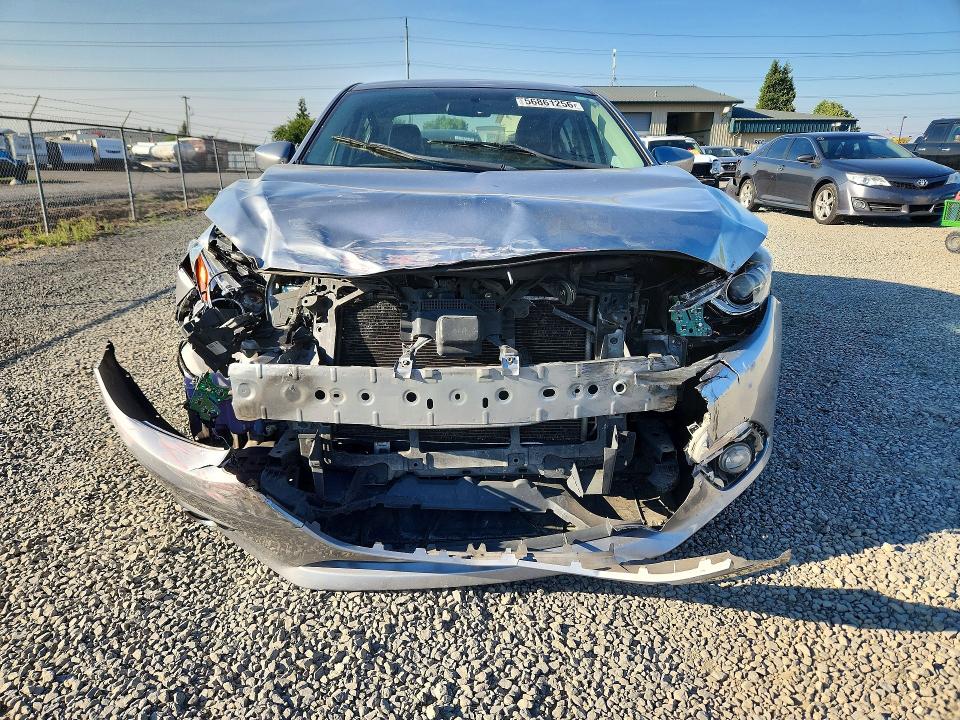 Photo 5 from auction – 2014 MAZDA 3 with VIN JM1BM1V37E1107859