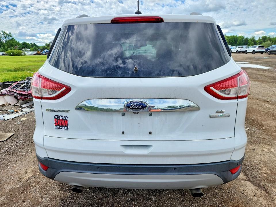 Photo 6 from auction – 2016 FORD ESCAPE with VIN 1FMCU0GX5GUC53575