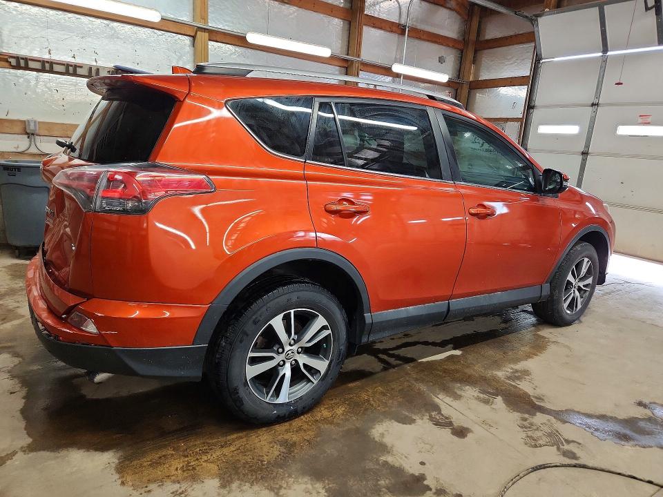 Photo 3 from auction – 2016 TOYOTA RAV4 with VIN 2T3RFREV7GW478355