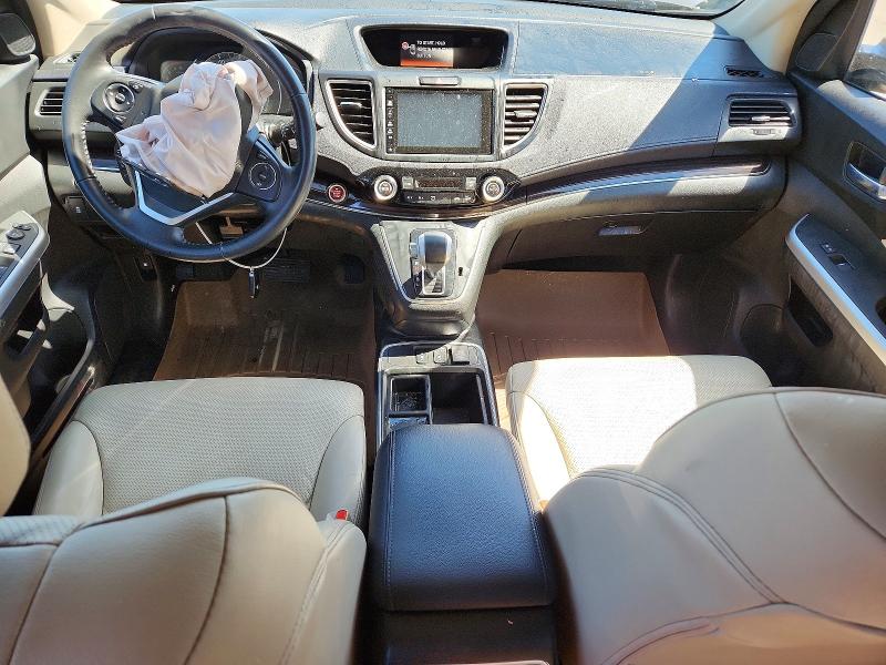 Photo 8 from auction – 2015 HONDA CR-V with VIN 2HKRM4H77FH611305