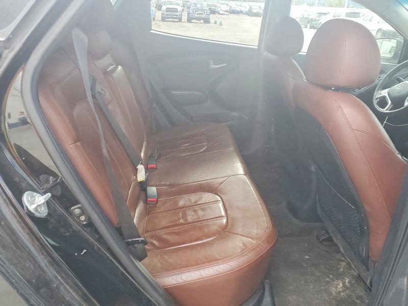 Photo 10 from auction – 2011 HYUNDAI TUCSON with VIN KM8JUCAC6BU291095
