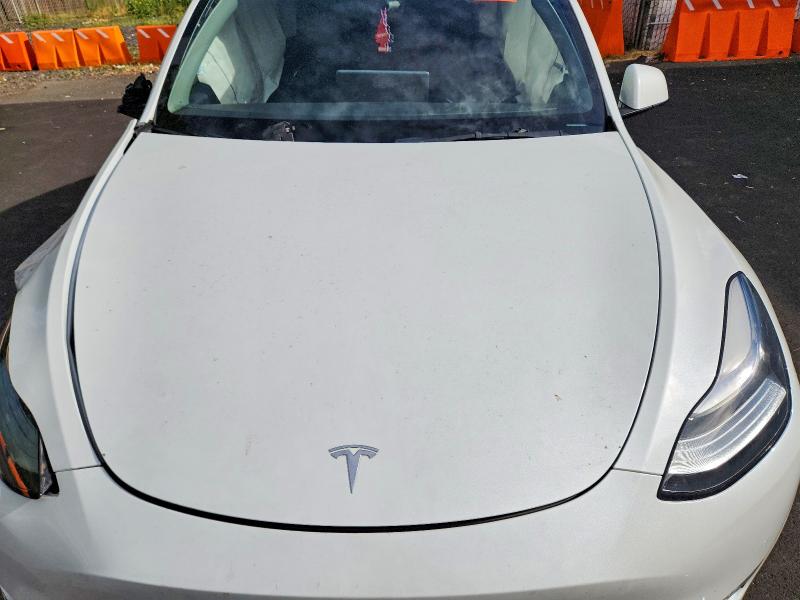 Photo 11 from auction – 2022 TESLA MODEL Y with VIN 7SAYGDEE7NF407240