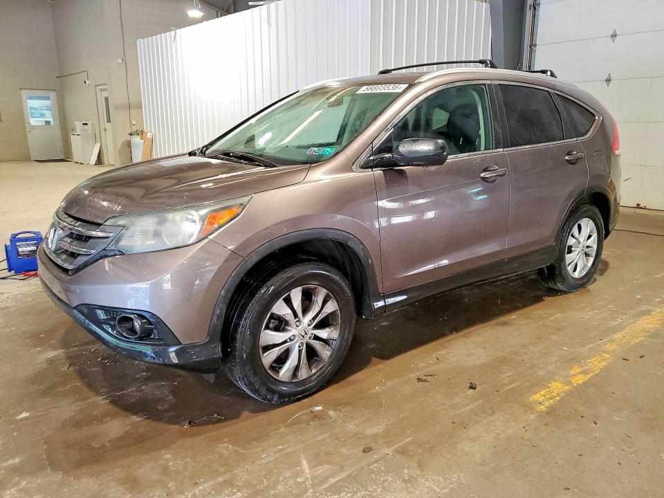 HONDA CR-V 2014 with VIN 2HKRM4H54EH700620 - Photo from auction