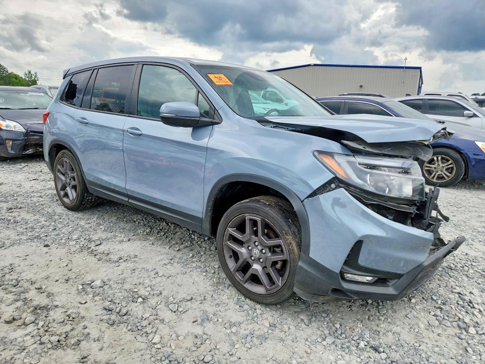 Photo 4 from auction – 2023 HONDA PASSPORT with VIN 5FNYF8H57PB019253