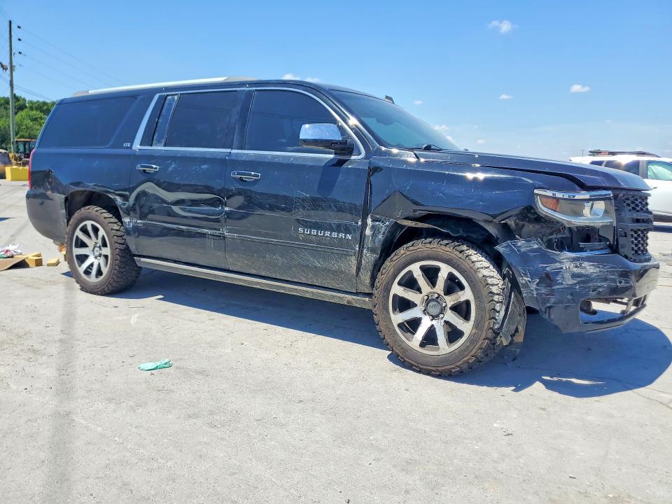 Photo 4 from auction – 2015 CHEVROLET SUBURBAN with VIN 1GNSKKKC8FR207589
