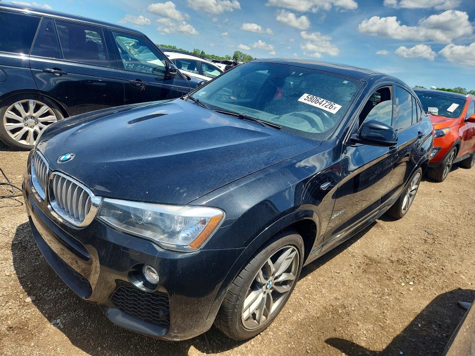 BMW X4 2015 with VIN 5UXXW3C54F0M87359 - Photo from auction