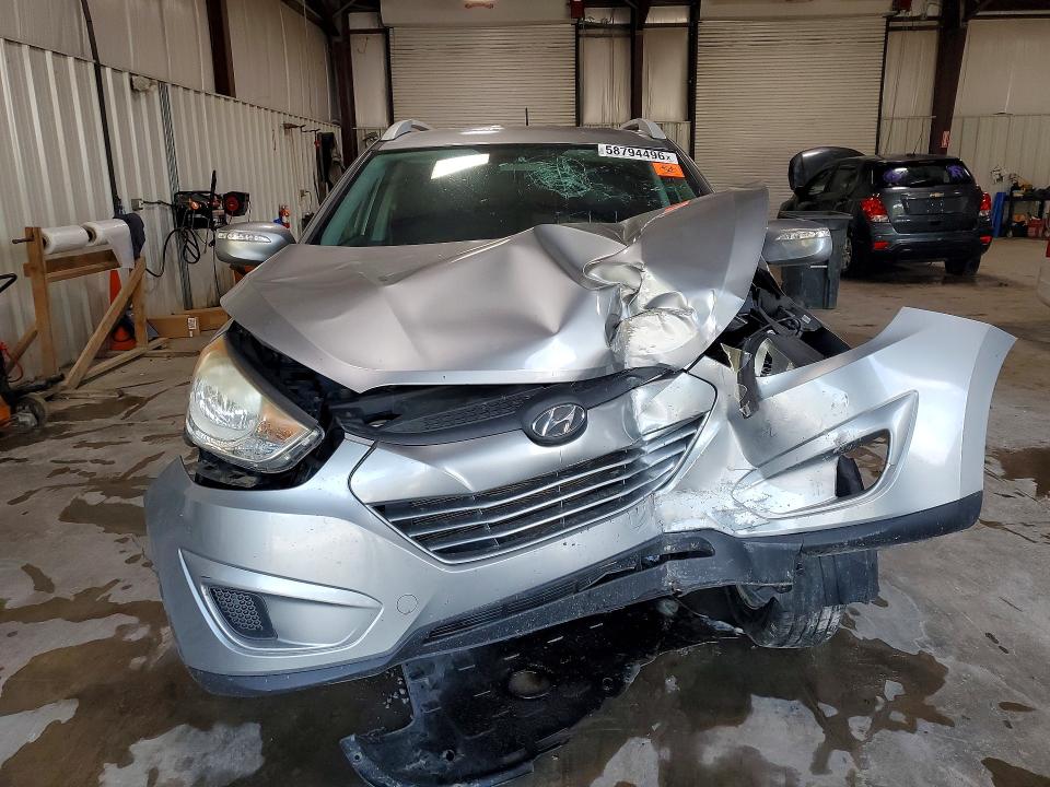 Photo 5 from auction – 2012 HYUNDAI TUCSON with VIN KM8JUCAC8CU394536