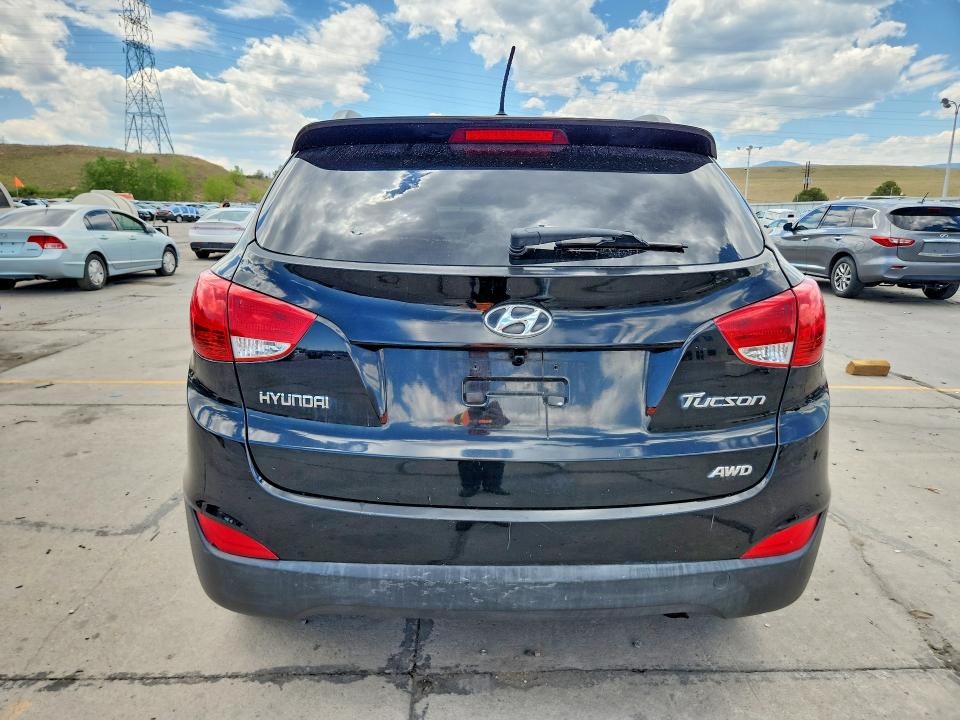 Photo 6 from auction – 2011 HYUNDAI TUCSON with VIN KM8JUCAC0BU257511