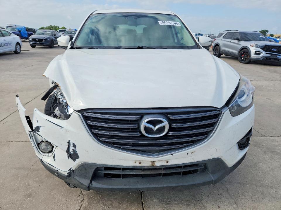 Photo 5 from auction – 2016 MAZDA CX-5 with VIN JM3KE2DY8G0852376