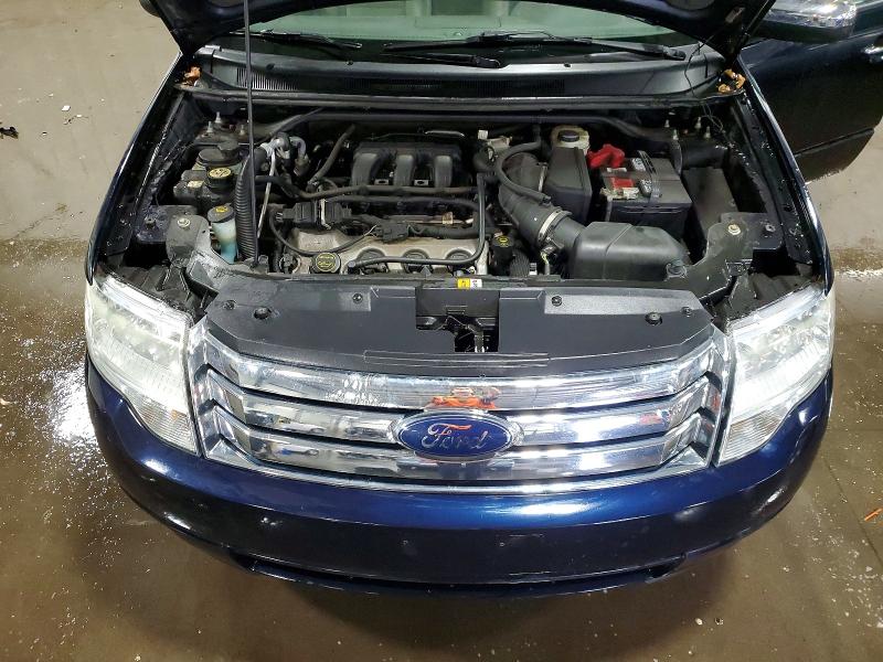 Photo 12 from auction – 2008 FORD TAURUS X with VIN 1FMDK06W28GA30221