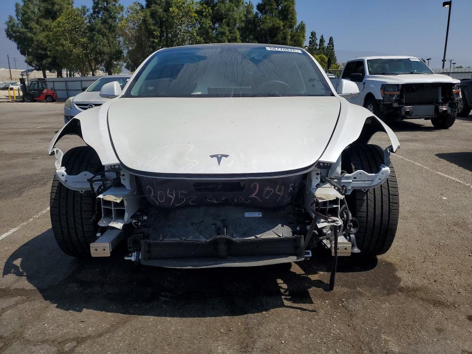 Photo 5 from auction – 2020 TESLA MODEL 3 with VIN 5YJ3E1EA5LF803883