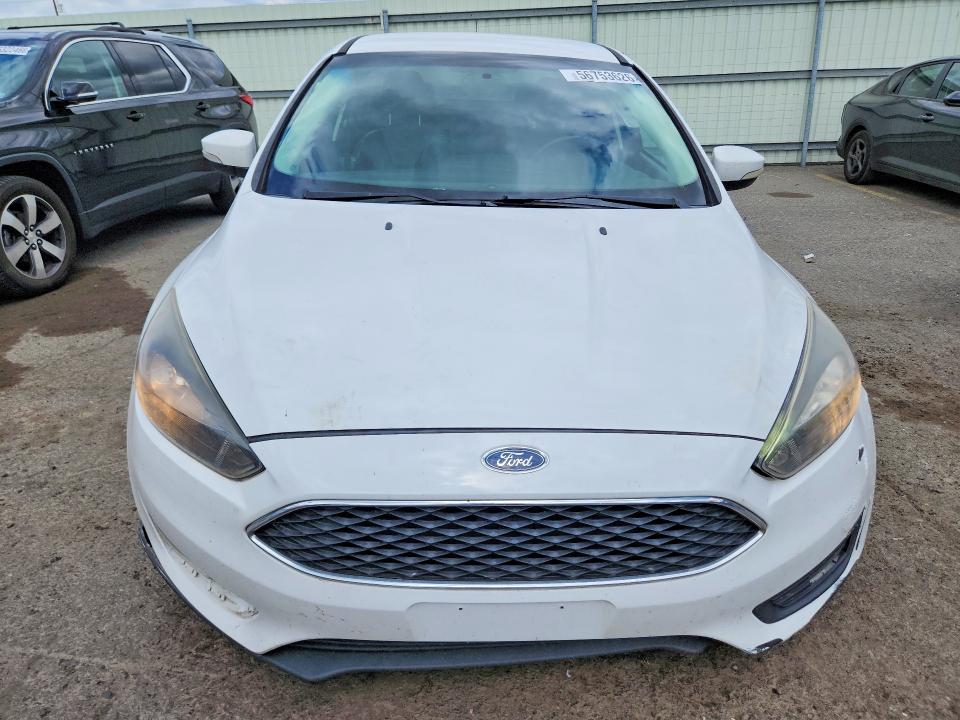 Photo 5 from auction – 2016 FORD FOCUS with VIN 1FADP3F21GL209382