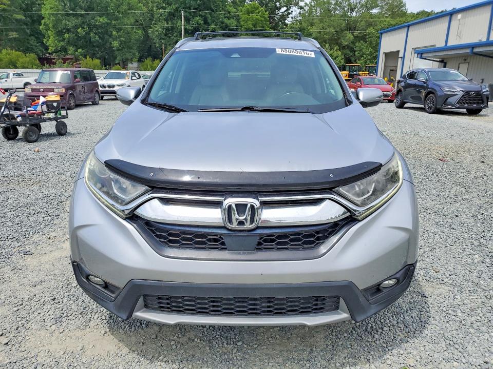 Photo 5 from auction – 2017 HONDA CR-V with VIN 2HKRW2H84HH647348