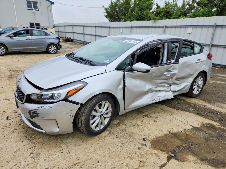 KIA FORTE 2017 with VIN 3KPFL4A7XHE098770 - Photo from auction