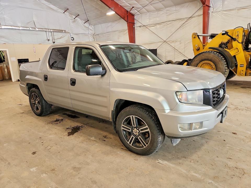 Photo 4 from auction – 2014 HONDA RIDGELINE with VIN 5FPYK1F73EB006415